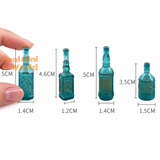 Miniature turquoise glass bottles in four vintage designs, measuring 3.5–5 cm tall, for dollhouse decor, miniature kitchen displays, and tiny food styling.