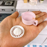 Exprimidor manual de cítricos REAL en miniatura (rosa)