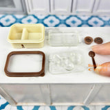 Caja bento en miniatura con cara sonriente