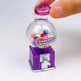 Real functioning miniature chocolate dispenser in purple from RealMiniWorld — palm-sized gumball machine that actually works